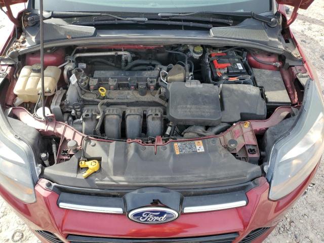 Photo 11 from auction – 2014 FORD FOCUS TITA with VIN 1FADP3N23EL422705