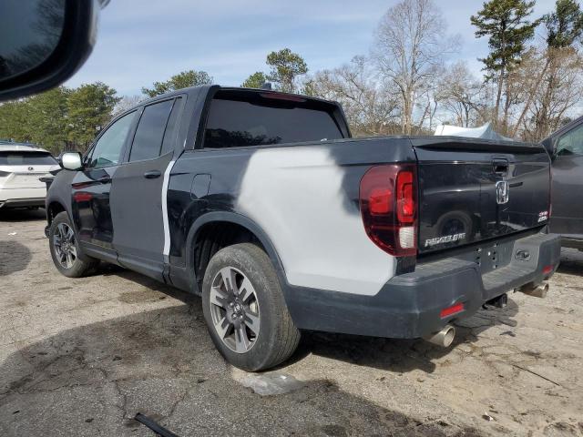 Photo 2 from auction – 2021 HONDA RIDGELINE with VIN 5FPYK3F11MB002479