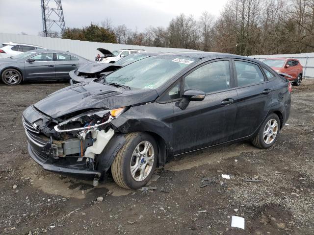 FORD FIESTA SE 2014 with VIN 3FADP4BJ9EM151858 - Photo from auction