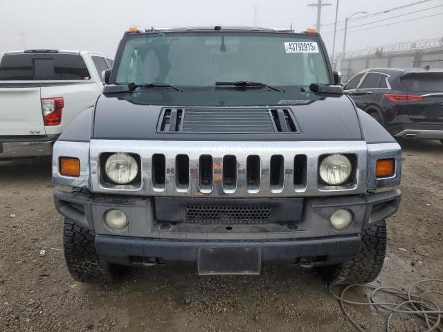 Photo 5 from auction – 2003 HUMMER H2 with VIN 5GRGN23U83H143843