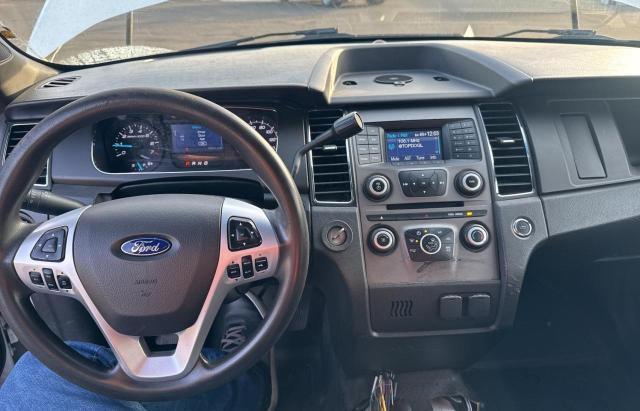 Photo 9 from auction – 2014 FORD TAURUS POL with VIN 1FAHP2MK1EG129732