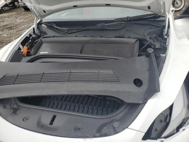 Photo 11 from auction – 2023 TESLA MODEL Y with VIN 7SAYGAEE7PF911417