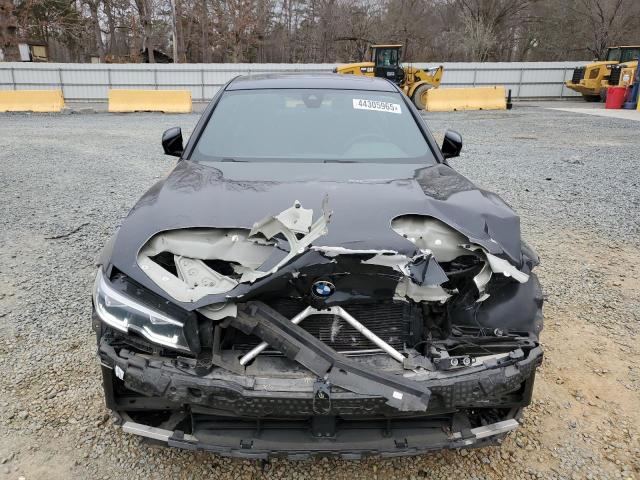 Photo 5 from auction – 2021 BMW 330I with VIN 3MW5R1J09M8B89529