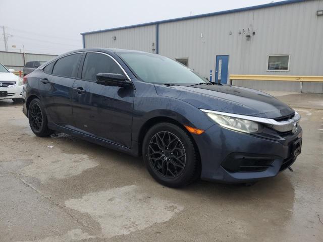 Photo 4 from auction – 2018 HONDA CIVIC EX with VIN 19XFC2F71JE025452
