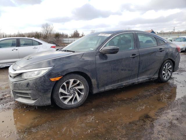 HONDA CIVIC EX 2018 with VIN 2HGFC2F72JH567519 - Photo from auction