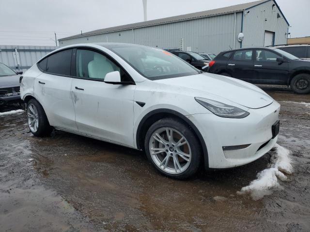 Photo 4 from auction – 2022 TESLA MODEL Y with VIN 7SAYGAEE4NF311208