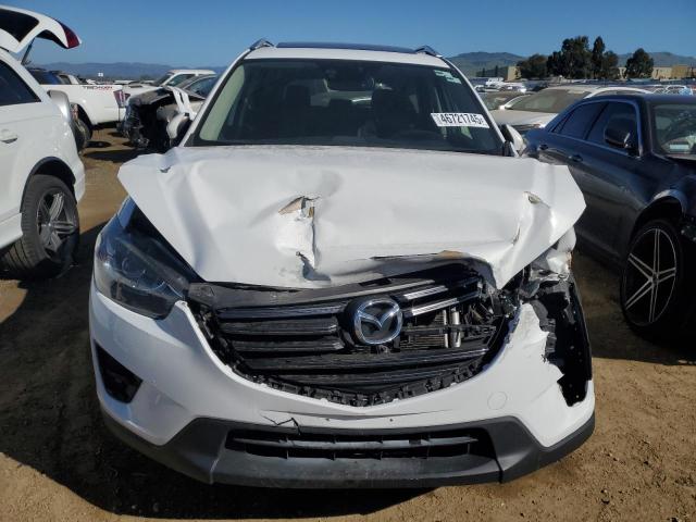 Photo 5 from auction – 2016 MAZDA CX-5 GT with VIN JM3KE2DY9G0686580