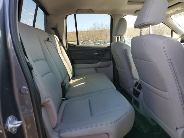 Photo 10 from auction – 2023 HONDA RIDGELINE with VIN 5FPYK3F53PB053988