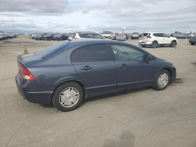 Photo 3 from auction – 2009 HONDA CIVIC HYBR with VIN JHMFA36259S009570