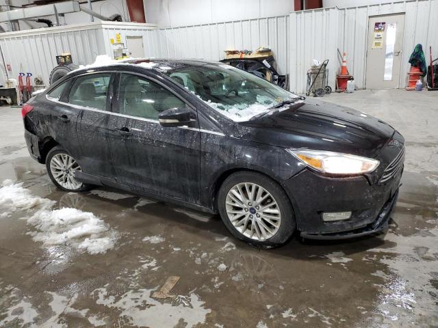 Photo 4 from auction – 2015 FORD FOCUS TITA with VIN 1FADP3J24FL213545