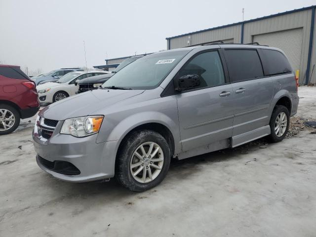 DODGE GRAND CARA 2015 with VIN 2C4RDGCGXFR648974 - Photo from auction