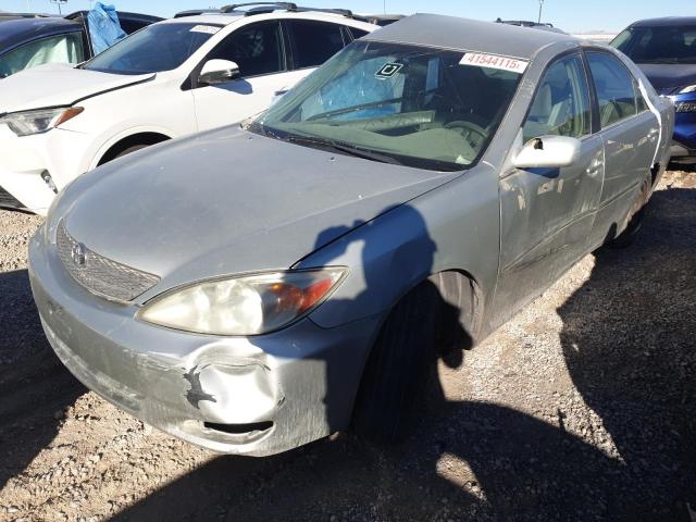 TOYOTA CAMRY LE 2003 with VIN JTDBE32K730196890 - Photo from auction