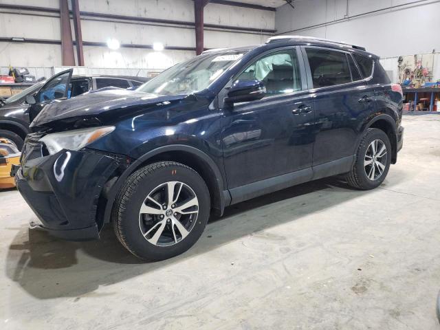 TOYOTA RAV4 XLE 2017 with VIN 2T3RFREV5HW620929 - Photo from auction