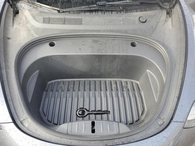 Photo 11 from auction – 2022 TESLA MODEL 3 with VIN 5YJ3E1EB3NF299331