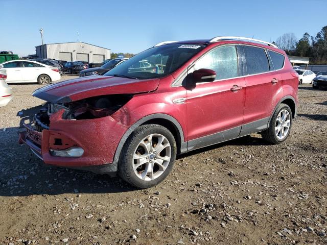 FORD ESCAPE TIT 2016 with VIN 1FMCU0J99GUC64718 - Photo from auction