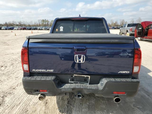 Photo 6 from auction – 2023 HONDA RIDGELINE with VIN 5FPYK3F51PB012274