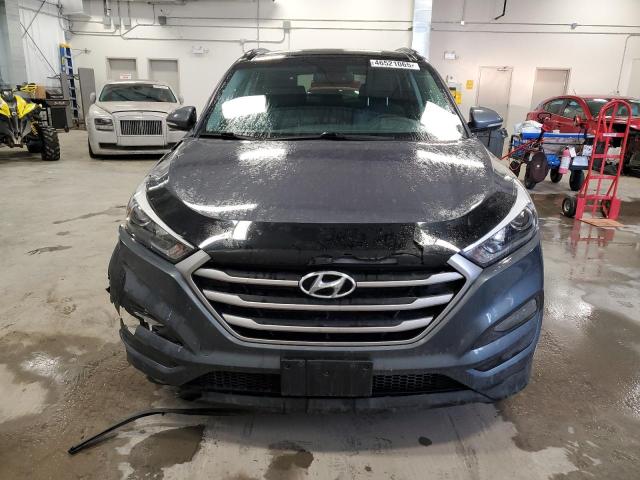 Photo 5 from auction – 2017 HYUNDAI TUCSON LIM with VIN KM8J3CA49HU457288