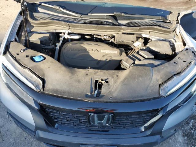 Photo 12 from auction – 2020 HONDA PASSPORT E with VIN 5FNYF8H01LB016072