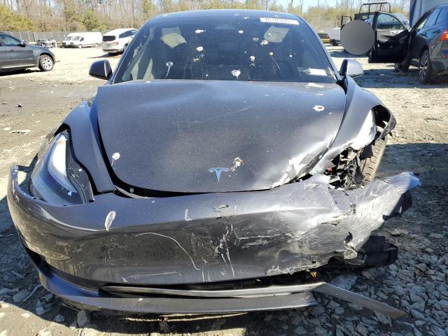 Photo 5 from auction – 2021 TESLA MODEL 3 with VIN 5YJ3E1EA3MF032390
