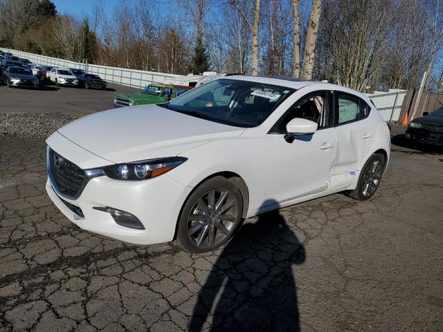 MAZDA 3 TOURING 2018 with VIN 3MZBN1L33JM179331 - Photo from auction