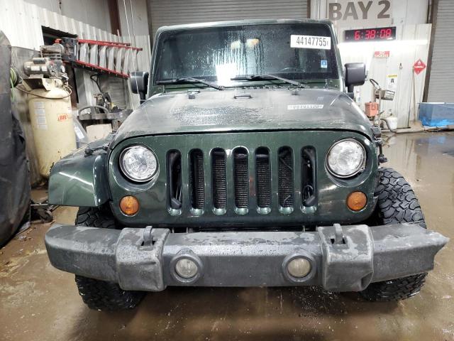 Photo 5 from auction – 2011 JEEP WRANGLER U with VIN 1J4BA5H13BL618294