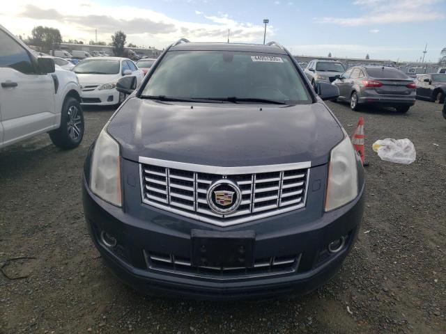 Снимка 5 от търг – 2013 CADILLAC SRX PERFOR с VIN 3GYFNDE34DS613883
