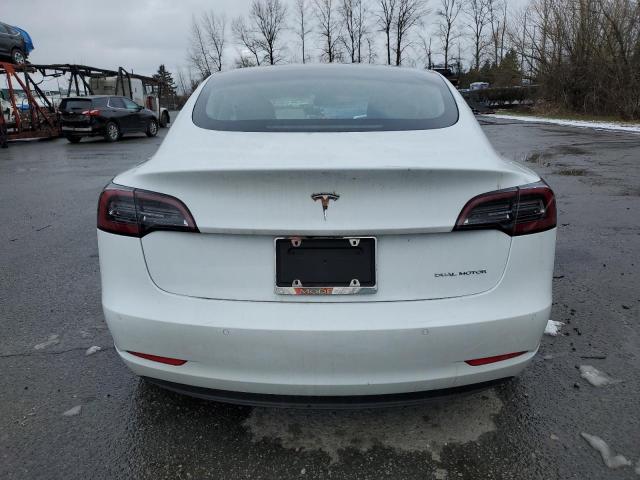 Photo 6 from auction – 2021 TESLA MODEL 3 with VIN 5YJ3E1EB4MF872882