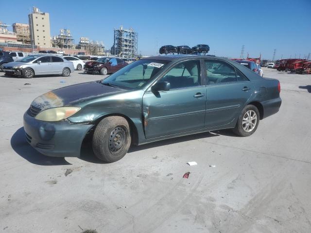 TOYOTA CAMRY LE 2004 with VIN 4T1BF32KX4U070641 - Photo from auction