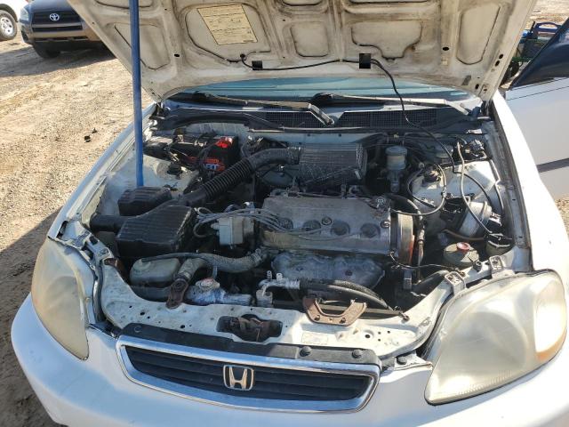 Photo 11 from auction – 1997 HONDA CIVIC LX with VIN JHMEJ6576VS012577