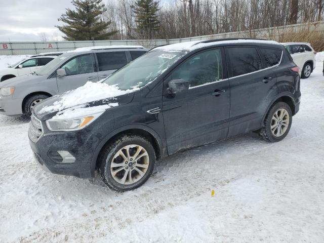 FORD ESCAPE SE 2018 with VIN 1FMCU9GD1JUD45509 - Photo from auction