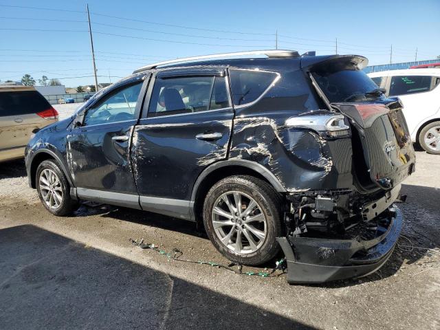 Photo 2 from auction – 2016 TOYOTA RAV4 LIMIT with VIN 2T3YFREV8GW290214