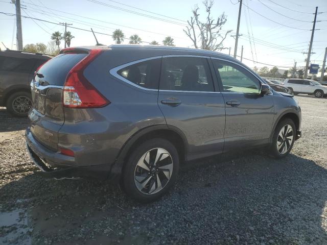 Photo 3 from auction – 2015 HONDA CR-V TOURI with VIN 5J6RM3H97FL024605