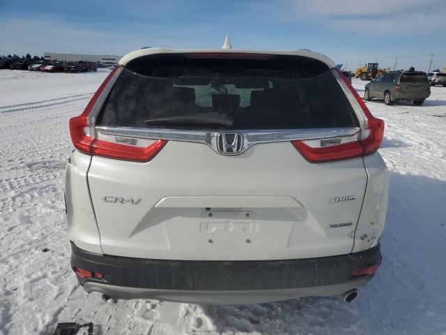 Photo 6 from auction – 2018 HONDA CR-V with VIN 2HKRW2H94JH632539