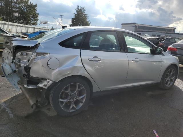 Foto 3 de la subasta – 2013 FORD FOCUS SE con VIN 1FADP3F21DL255113