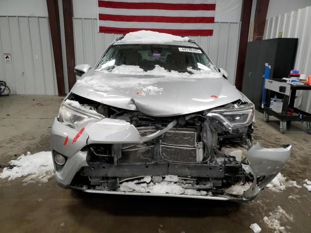 Photo 5 from auction – 2016 TOYOTA RAV4 HV LI with VIN JTMDJREV2GD022902
