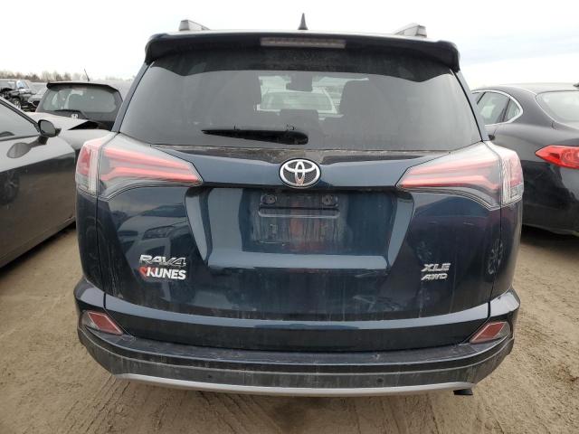 Photo 6 from auction – 2017 TOYOTA RAV4 XLE with VIN JTMRFREV4HD199332