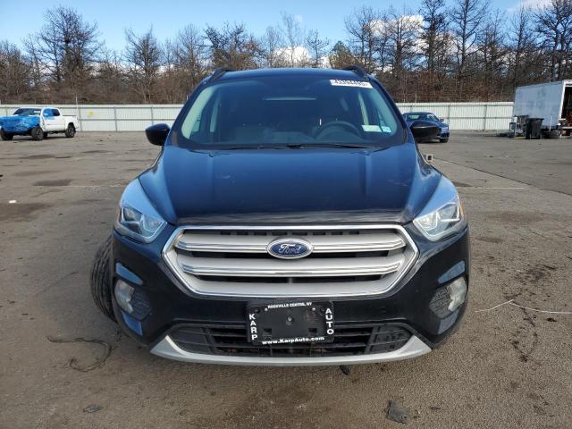 Photo 5 from auction – 2017 FORD ESCAPE SE with VIN 1FMCU9GD6HUC30317