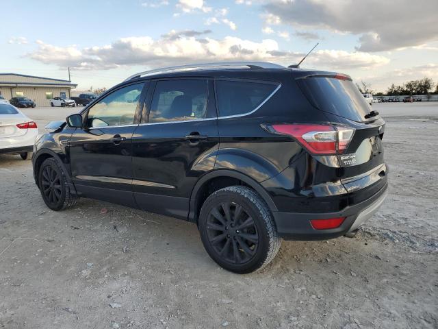 Photo 2 from auction – 2017 FORD ESCAPE TIT with VIN 1FMCU9JD1HUB51601