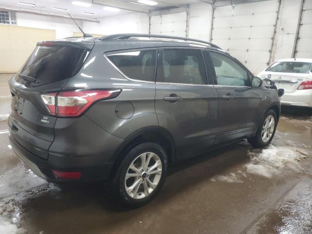 Photo 3 from auction – 2018 FORD ESCAPE SE with VIN 1FMCU9GD0JUC47555