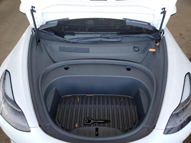 Photo 11 from auction – 2021 TESLA MODEL 3 with VIN 5YJ3E1EA2MF940393