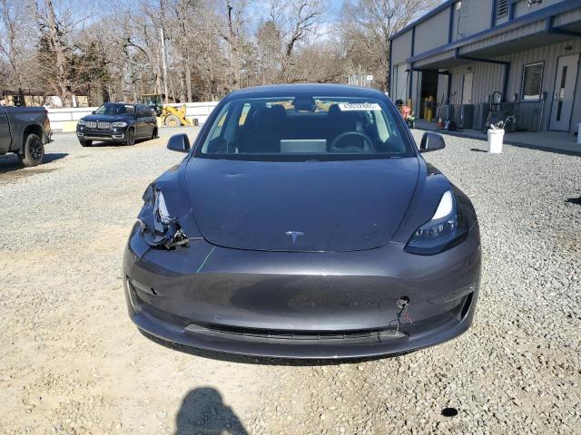 Photo 5 from auction – 2021 TESLA MODEL 3 with VIN 5YJ3E1EA4MF041910