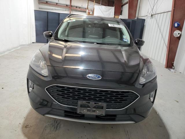 Photo 5 from auction – 2021 FORD ESCAPE SEL with VIN 1FMCU9H69MUA65017