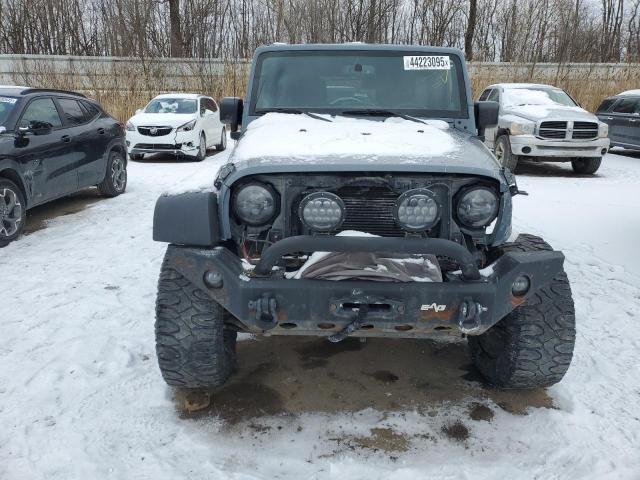 Photo 5 from auction – 2014 JEEP WRANGLER U with VIN 1C4BJWDG4EL318287