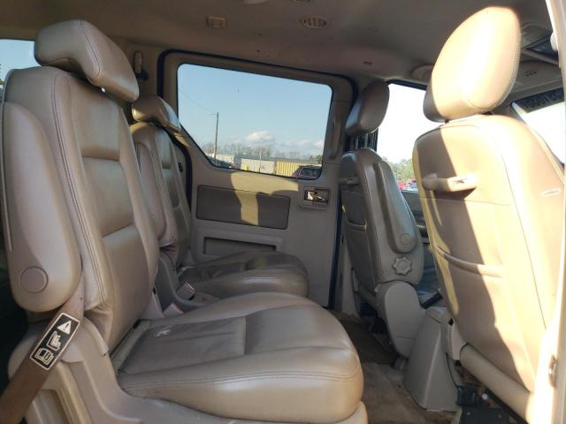 Photo 11 from auction – 2004 FORD FREESTAR L with VIN 2FMDA582X4BA53001