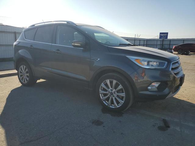 Photo 4 from auction – 2018 FORD ESCAPE TIT with VIN 1FMCU0J97JUC09241