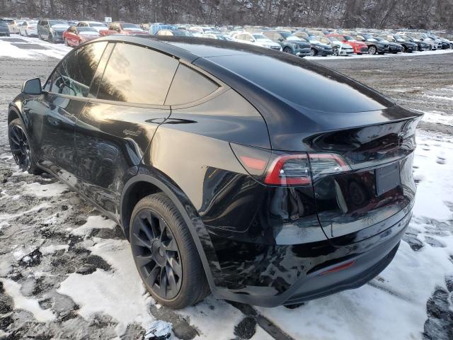 Photo 2 from auction – 2023 TESLA MODEL Y with VIN 7SAYGAEE6PF601064