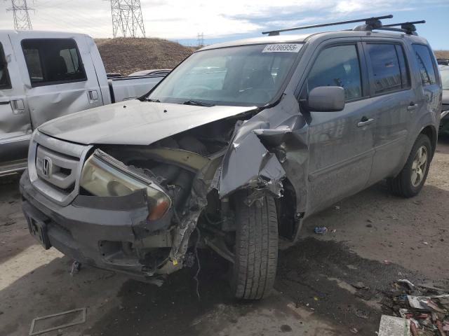 HONDA PILOT EXLN 2011 with VIN 5FNYF4H79BB073169 - Photo from auction