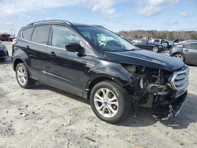 Photo 4 from auction – 2018 FORD ESCAPE SE with VIN 1FMCU0GD3JUB23632