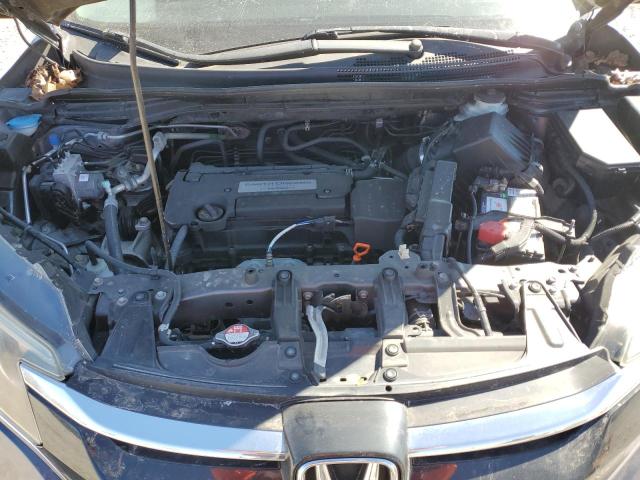 Photo 12 from auction – 2015 HONDA CR-V LX with VIN 3CZRM3H38FG702559