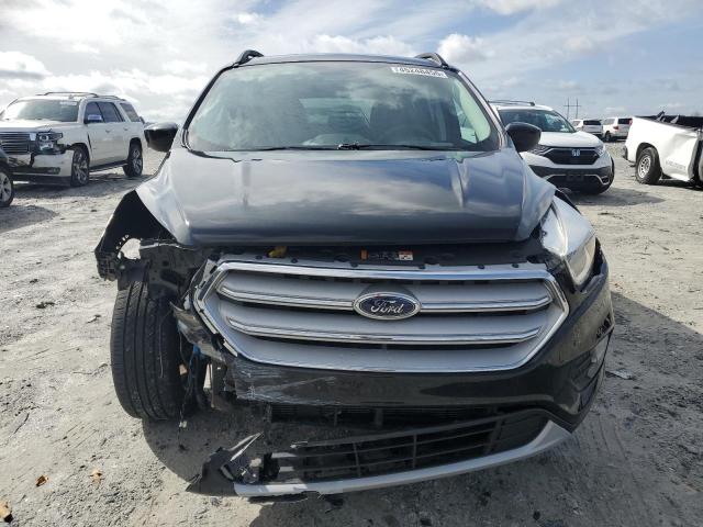 Photo 5 from auction – 2018 FORD ESCAPE SE with VIN 1FMCU0GD3JUB23632